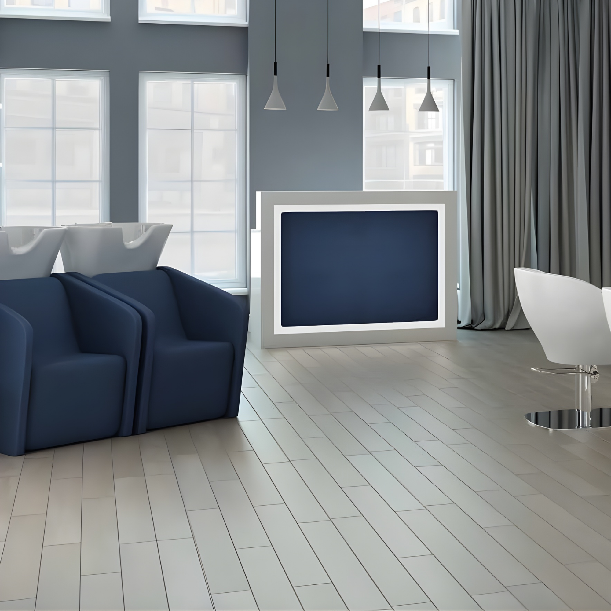 elegantan frizerski salon s tamnoplavim glavoperima i modernim recepcijskim pultom s bijelim okvirom